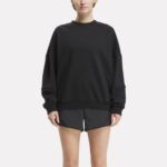 Imagen de Polera Deportiva Reebok Para Mujer Lux Oversized Crew 100075359 Negro con 50% de descuento oferta online | SuperCupon